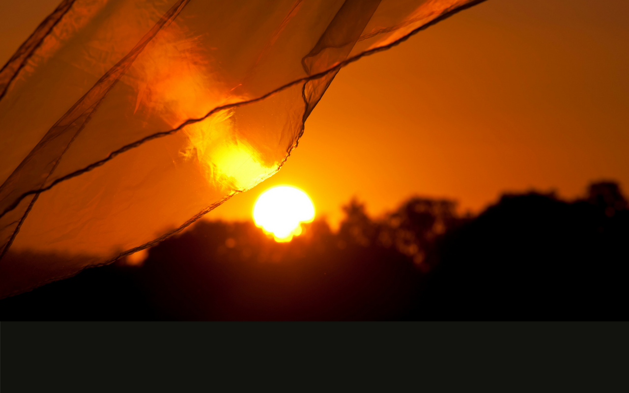 Sunset through curtains